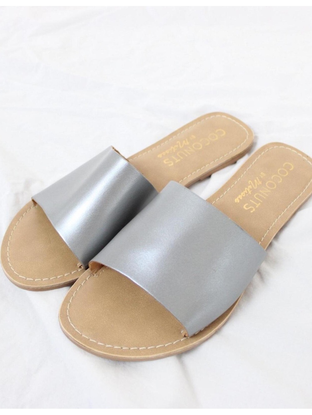 Coconuts by Matisse Cabana Slides in silver. Size 9